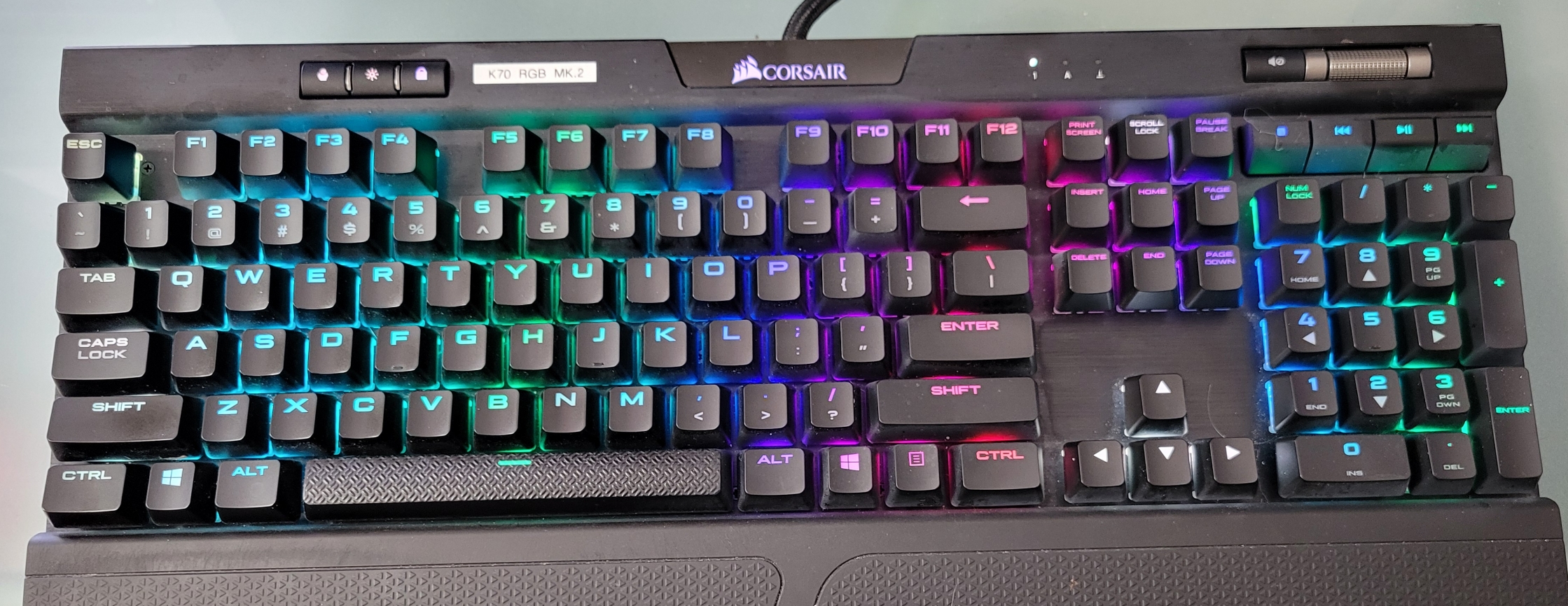 Corsair K70 RGB Keyboard with lighted keys in rainbow of colors
