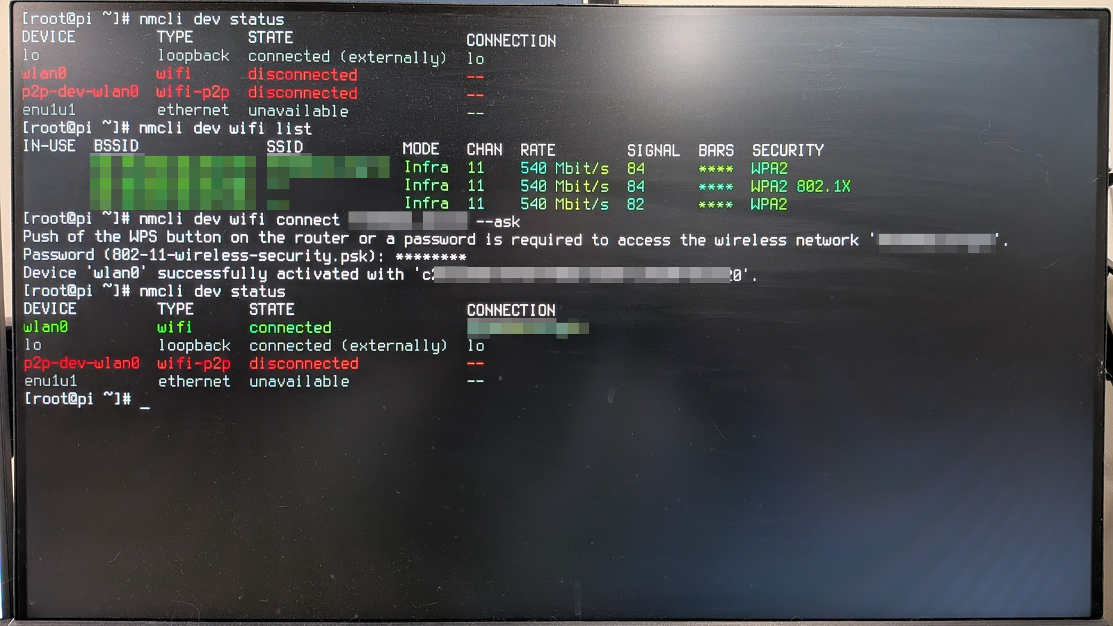 Command line output for 'nmcli dev status' with the wireless network in green/connected