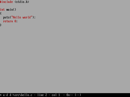 An editor in black and white, showing the source to a short 'hello world' program