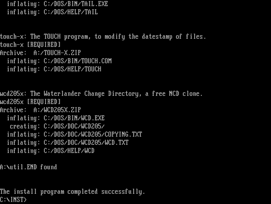 white text on a black background: the install program completed successfully