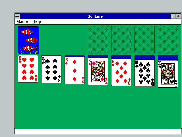 starting a new game of solitaire, a deck of cards on a green background